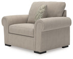 Chair and a half in heather light-gray fabric, front-side view with accent pillow