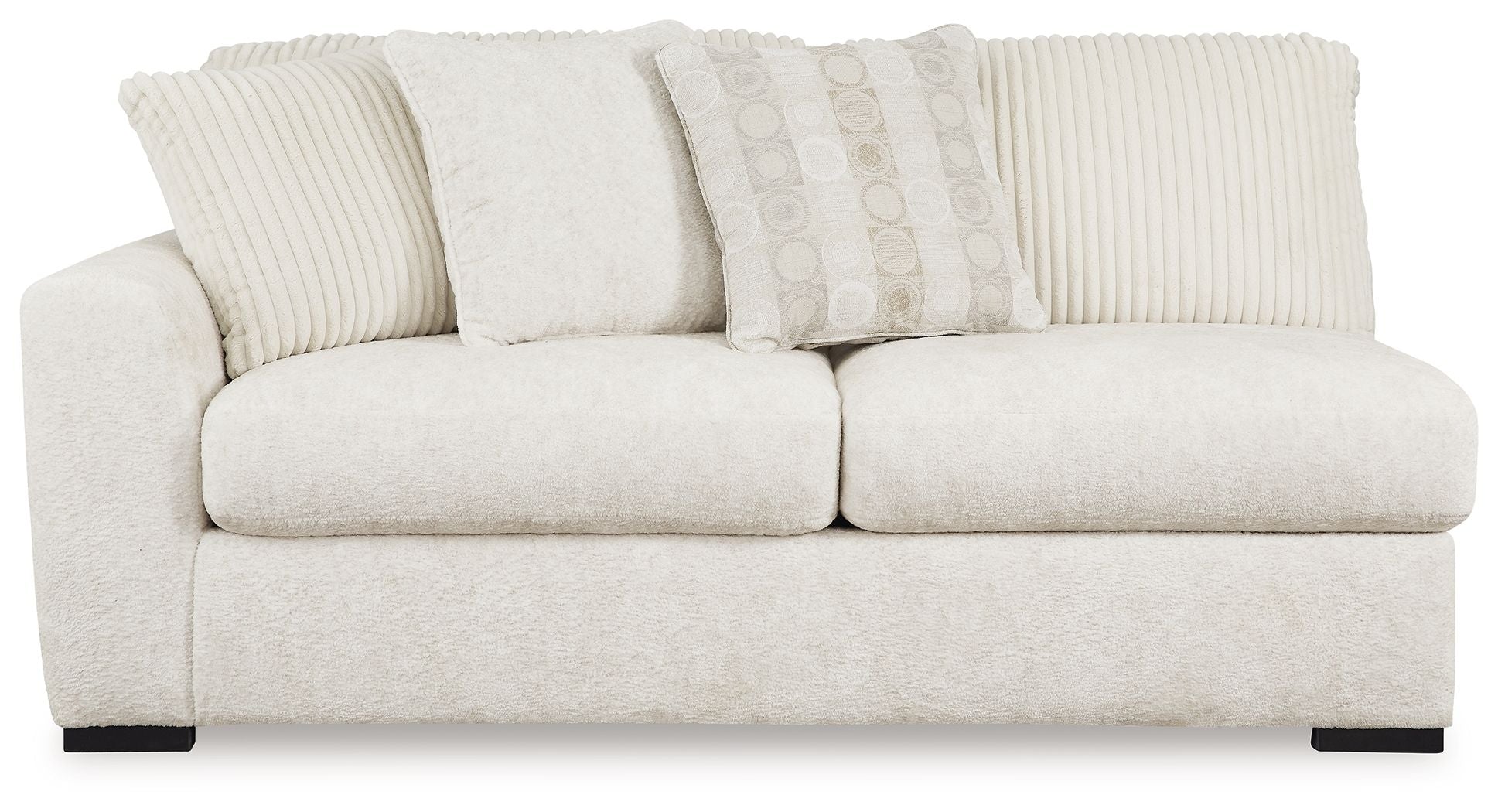 Light ivory fabric sofa with two seat cushions and multiple back pillows