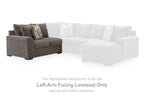Left-arm facing dark gray loveseat with square arms and patterned throw pillow