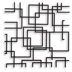 Black geometric wall decor with overlapping square frames and line bars