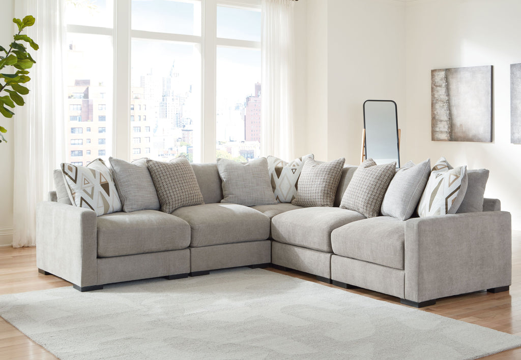 Pebble gray sectional sofa with chaise and geometric accent pillows