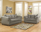 Living room set with gray sofa and loveseat, padded arms, and tufted back cushions