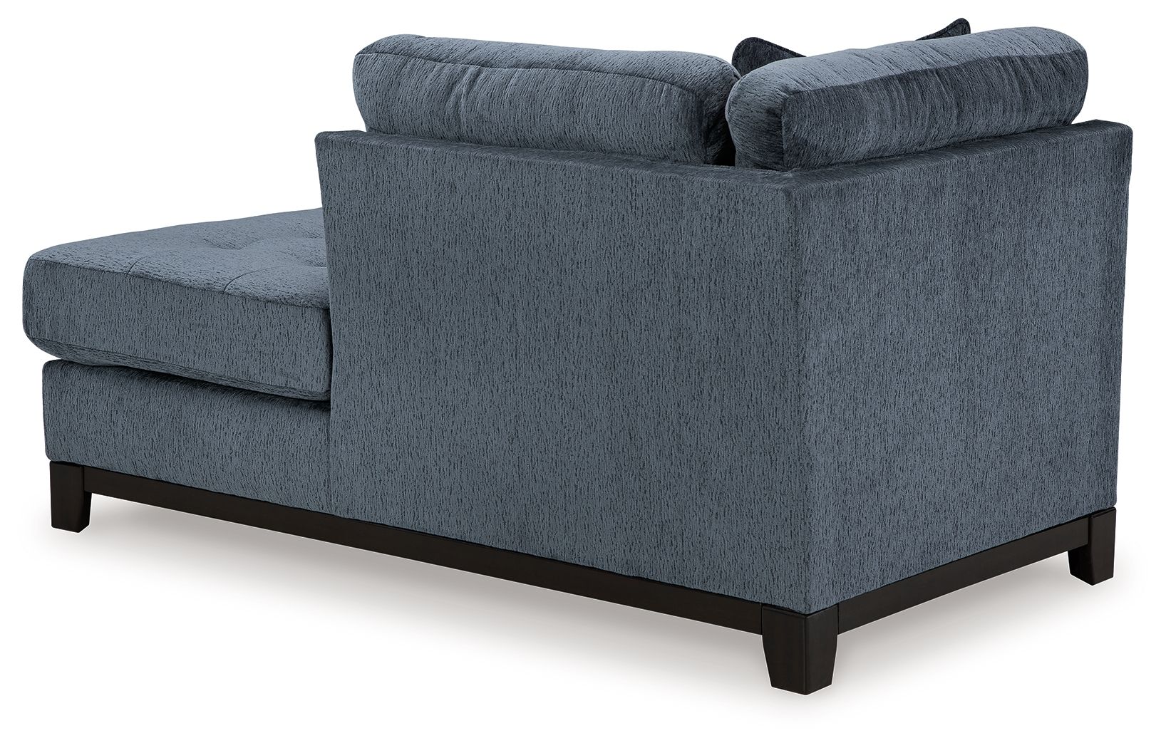 Navy fabric corner chaise with tufted arms and dark wood legs