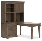 Weathered gray door hutch with two cabinet doors and three open shelves, on desk unit