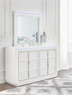 White dresser with attached mirror and mesh-trim grid doors