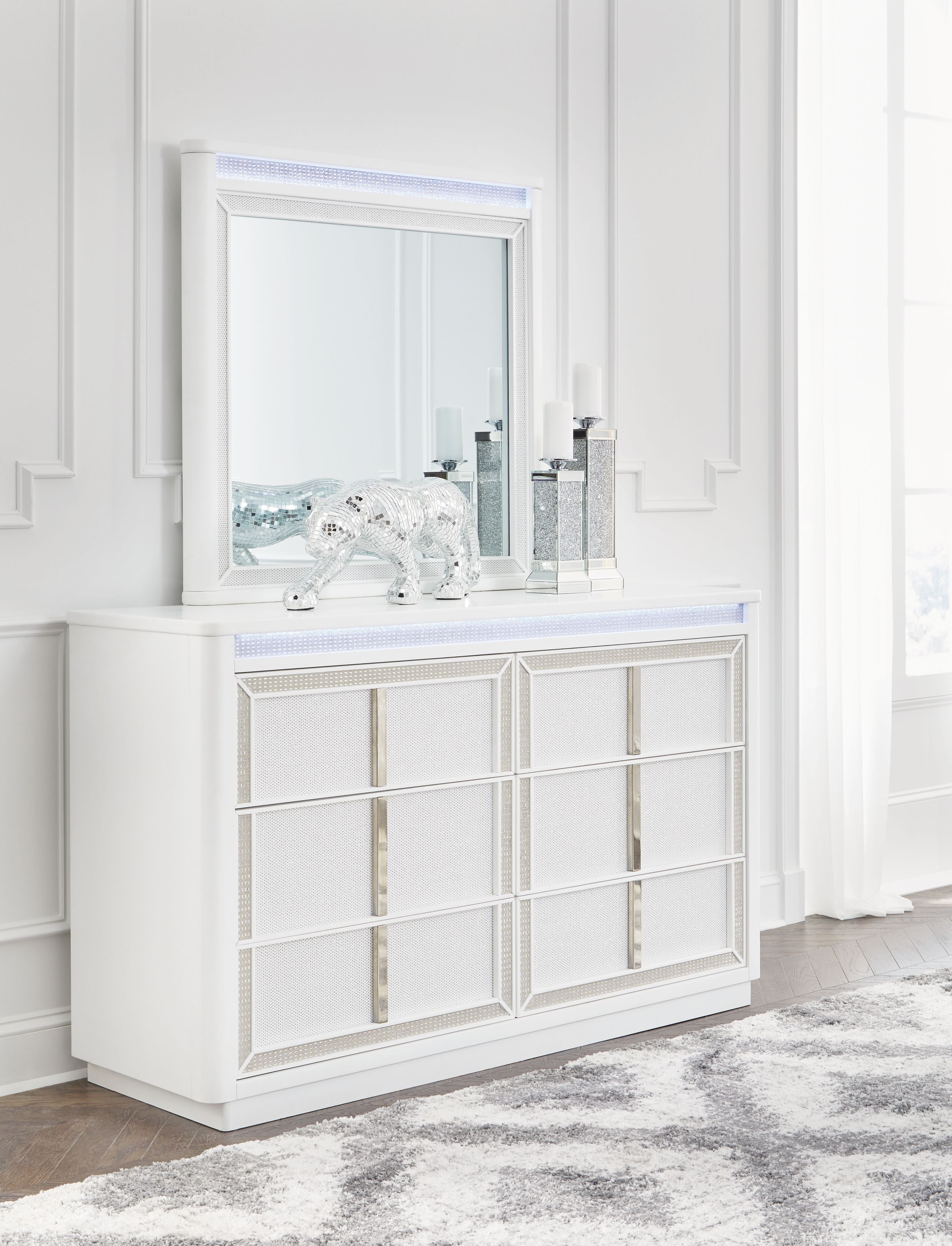 White dresser with attached mirror and mesh-trim grid doors
