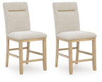 Set of 2 upholstered barstools with light brown fabric, wood legs, brass handle