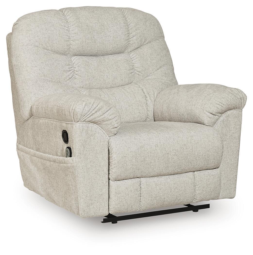 Light beige upholstered zero-wall recliner with tufted cushions, rounded armrests, and base