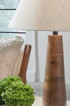 Wood table lamp with cream fabric shade and dark brown tapered wooden base