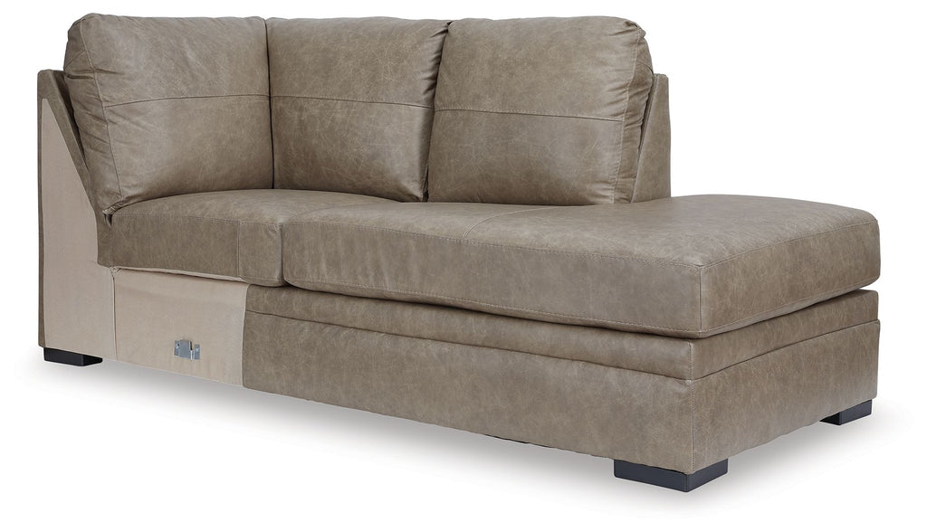 Corner chaise lounge with taupe fabric upholstery and track arms, dark base feet.