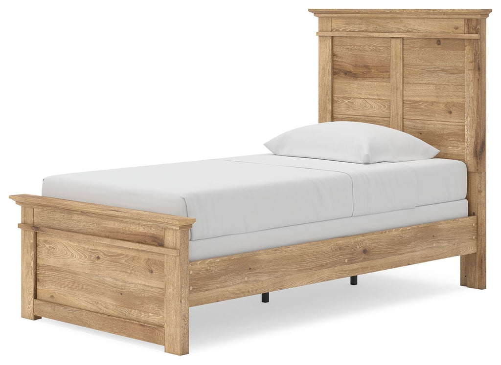 Light brown panel bed with paneled footboard and white mattress with pillows