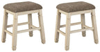 Pair of upholstered stools with textured neutral fabric seats and light wood turned legs