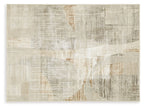 Beige distressed area rug with faded blocks and lines, flat weave, rectangular