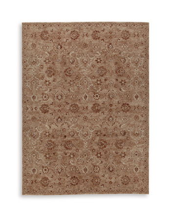 Light brown rectangular rug with ornate floral medallion pattern