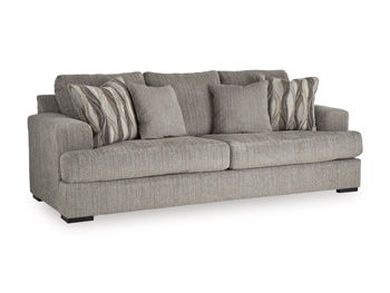 Gray upholstered sofa with rolled arms and tufted back cushions