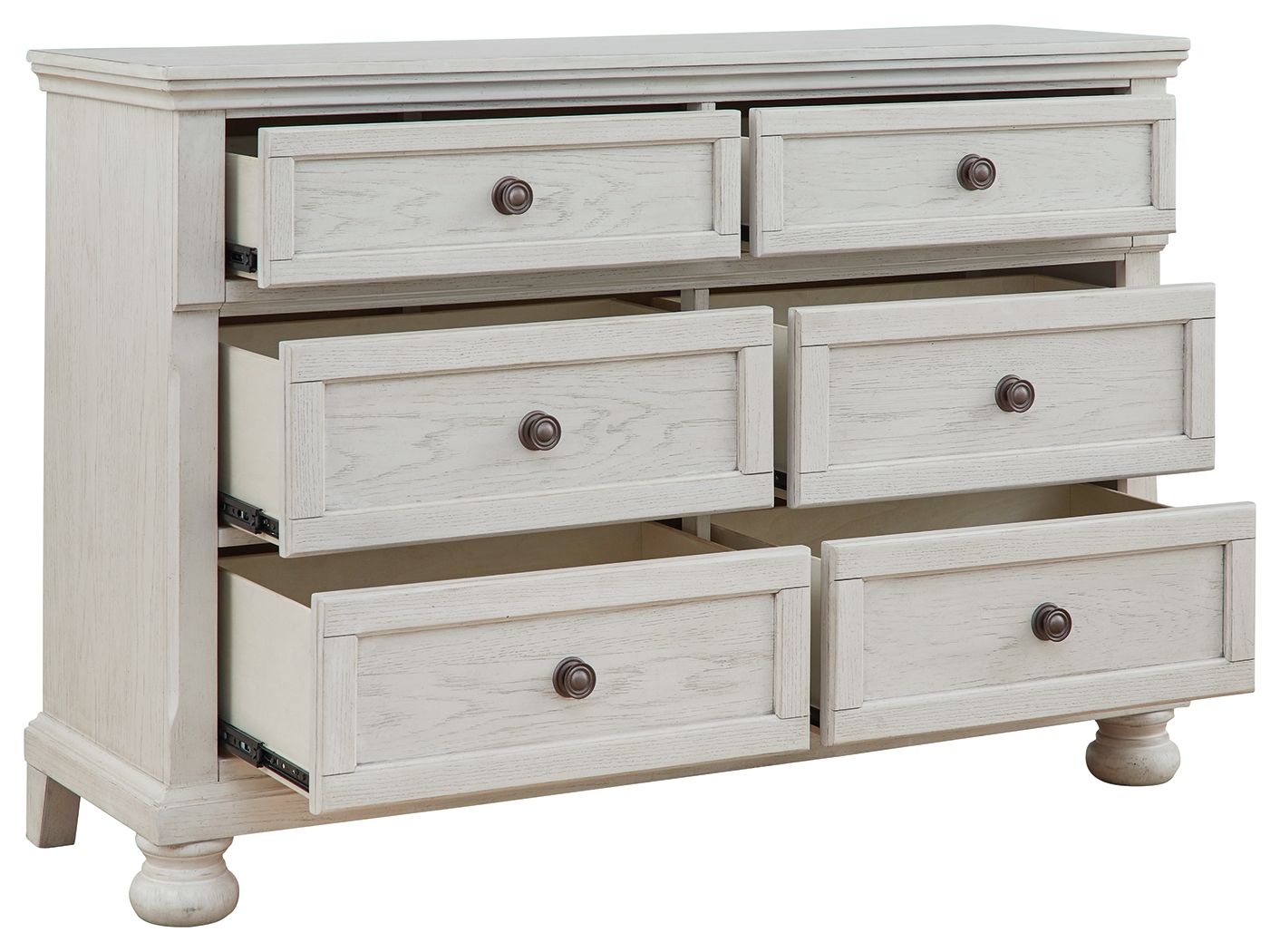 Antique white dresser with seven drawers and round knob pulls, open drawer fronts.