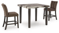 Counter-height dining table with dark brown bar stools and marble-look tabletop