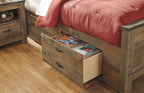 Panel bed storage drawer beneath the bed frame in dark brown wood
