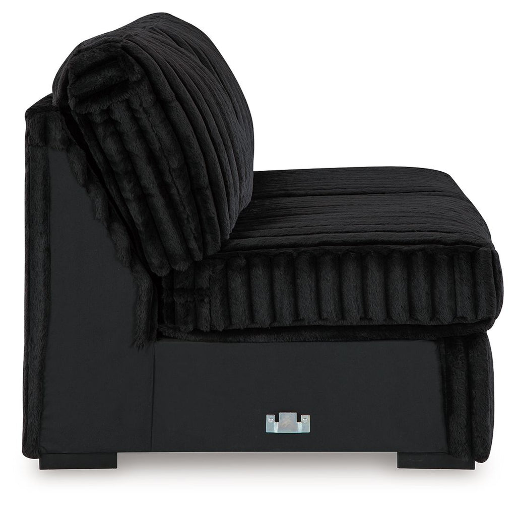 Onyx armless loveseat with rounded back, tufted seat, and black fabric