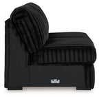 Onyx armless loveseat with rounded back, tufted seat, and black fabric