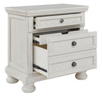 Antique white nightstand with open drawer showing interior and two drawer pulls