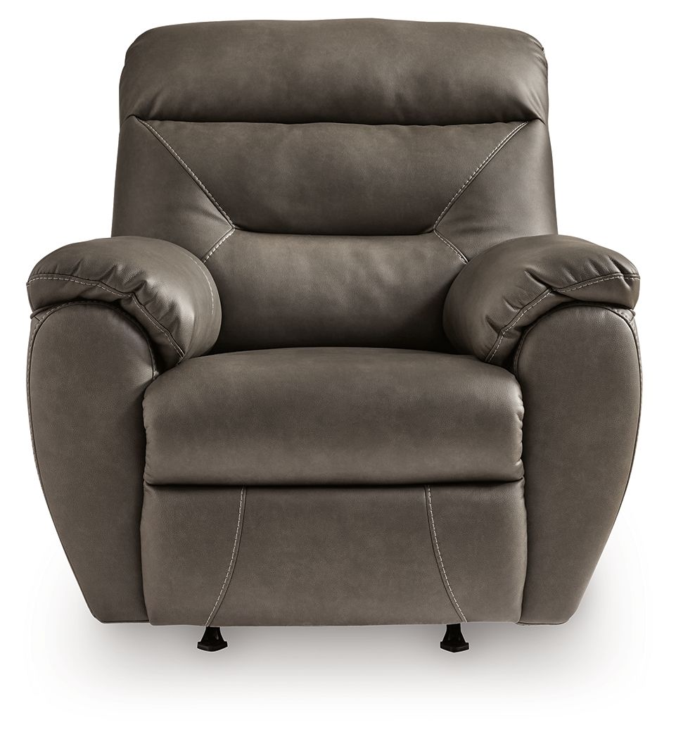 Dark gray rocker recliner with rounded back and cushioned seat, front view