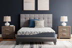 10-inch firm mattress in bed frame, white and blue patterned top with pillows