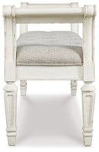 Accent bench with antique white carved legs and gray upholstered seat