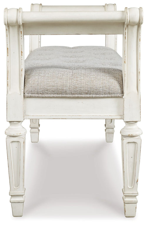 Accent bench with antique white carved legs and gray upholstered seat