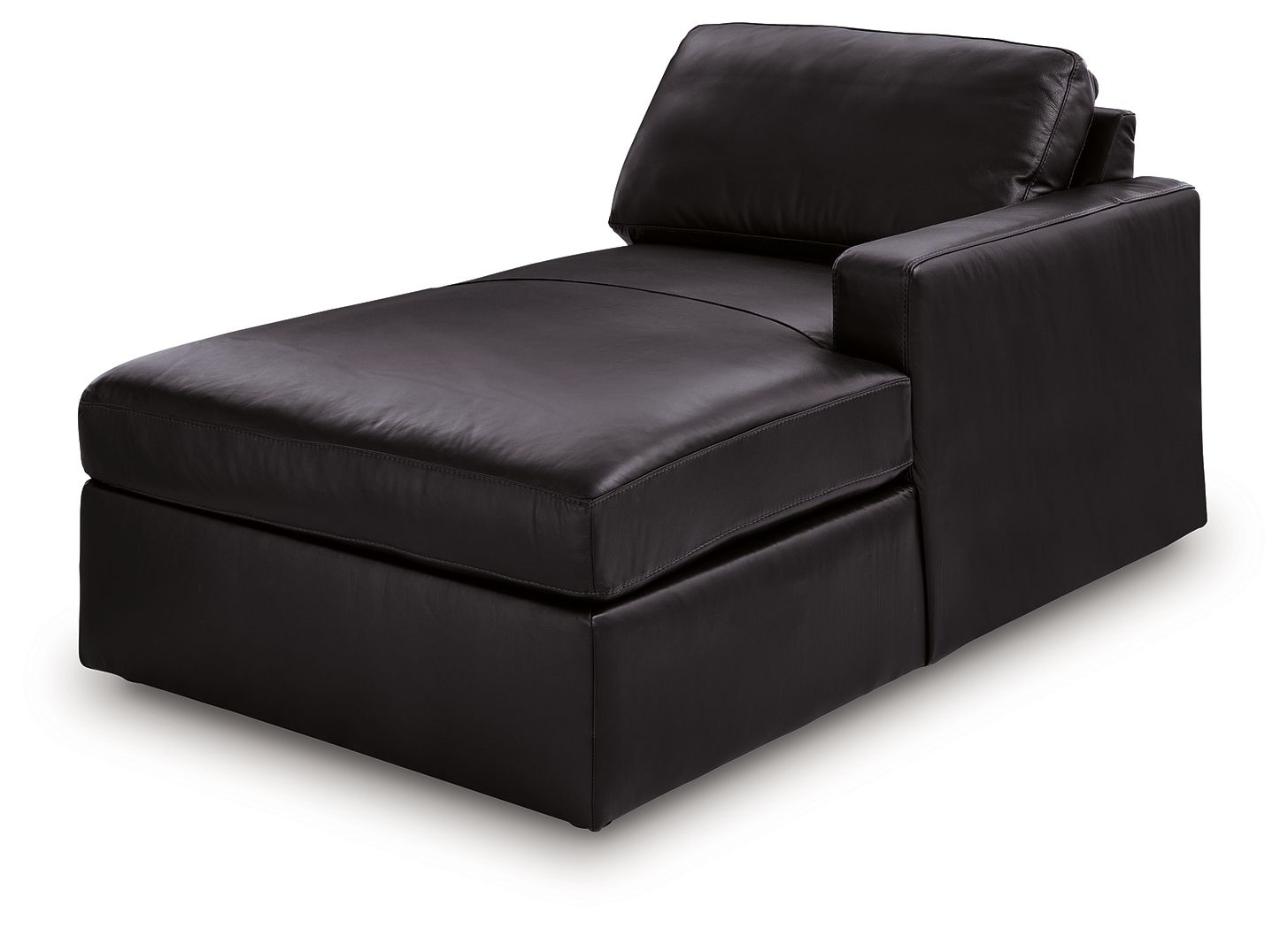 Black corner chaise with low armrest and wide seat, shown from side angle