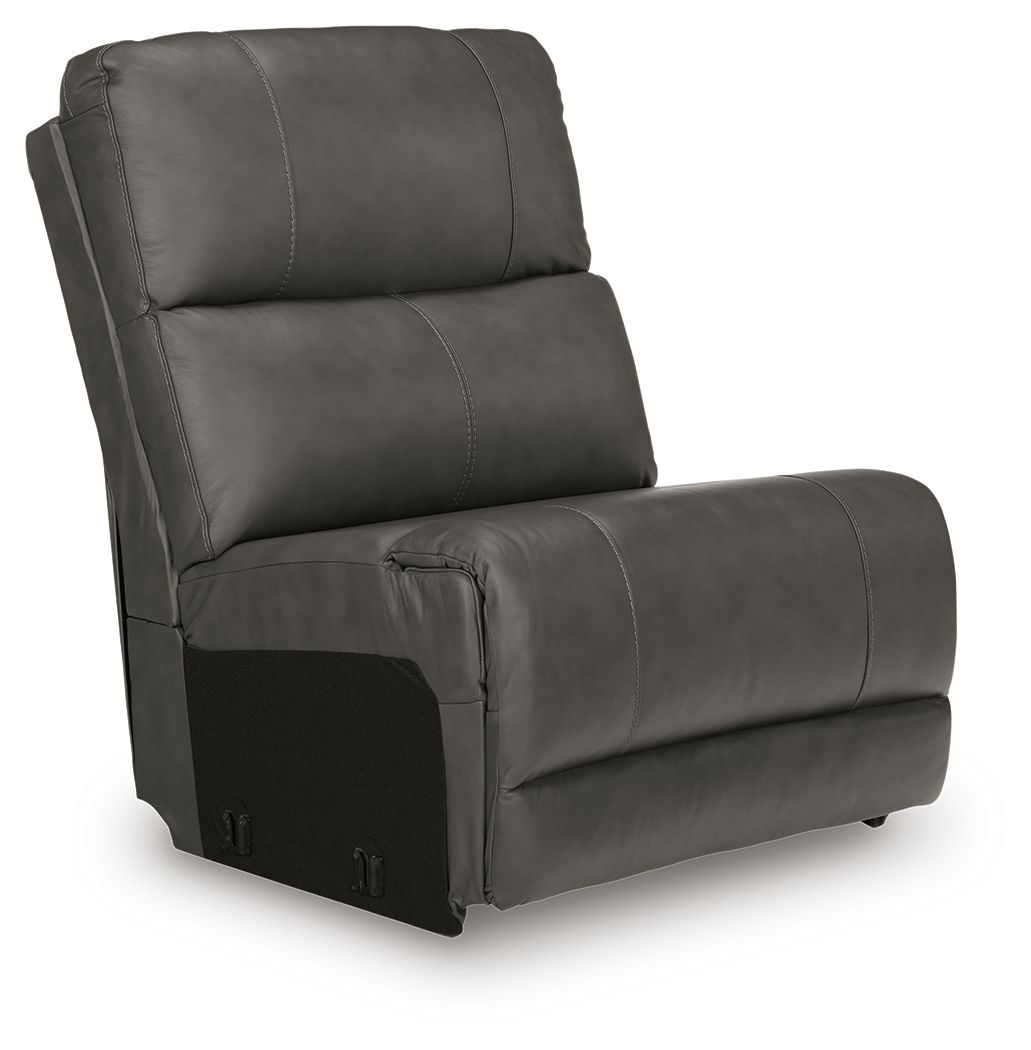 Dark gray armless chair with padded back and cushioned seat, visible stitching