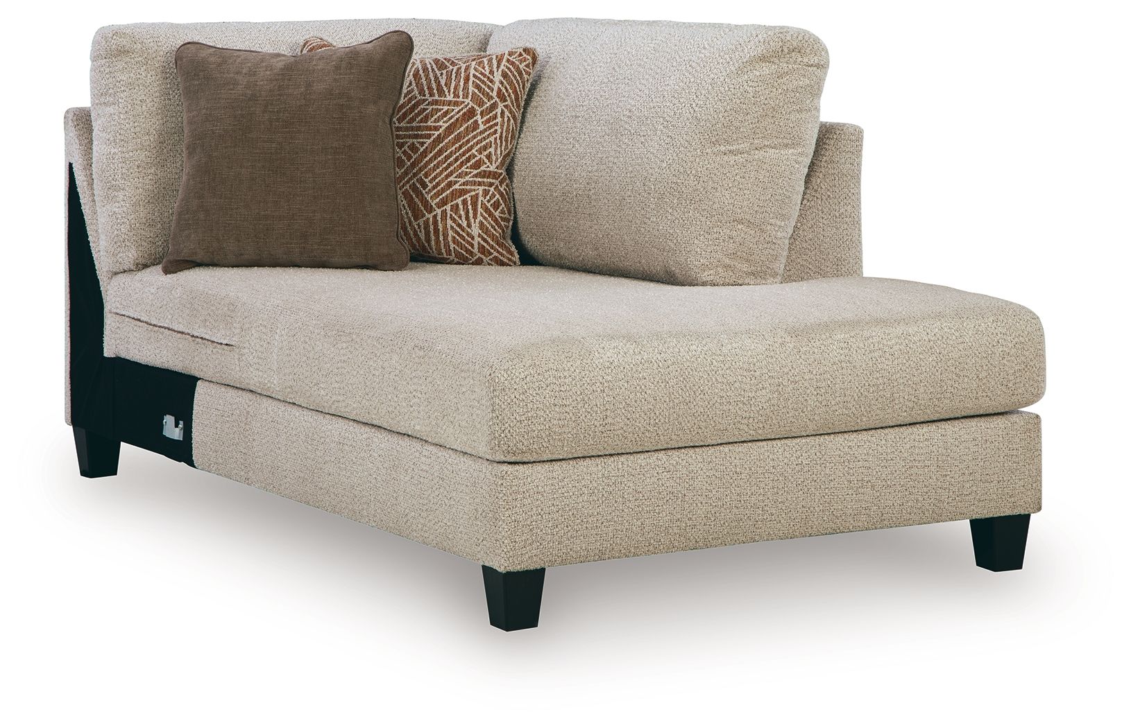 Latte corner chaise sofa with beige upholstery, dark legs, and two throw pillows