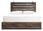 Panel bed with slatted headboard and dark wood front rail, white pillows and mattress
