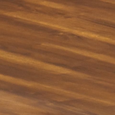 Round rustic brown drop-leaf table top with wood grain detail