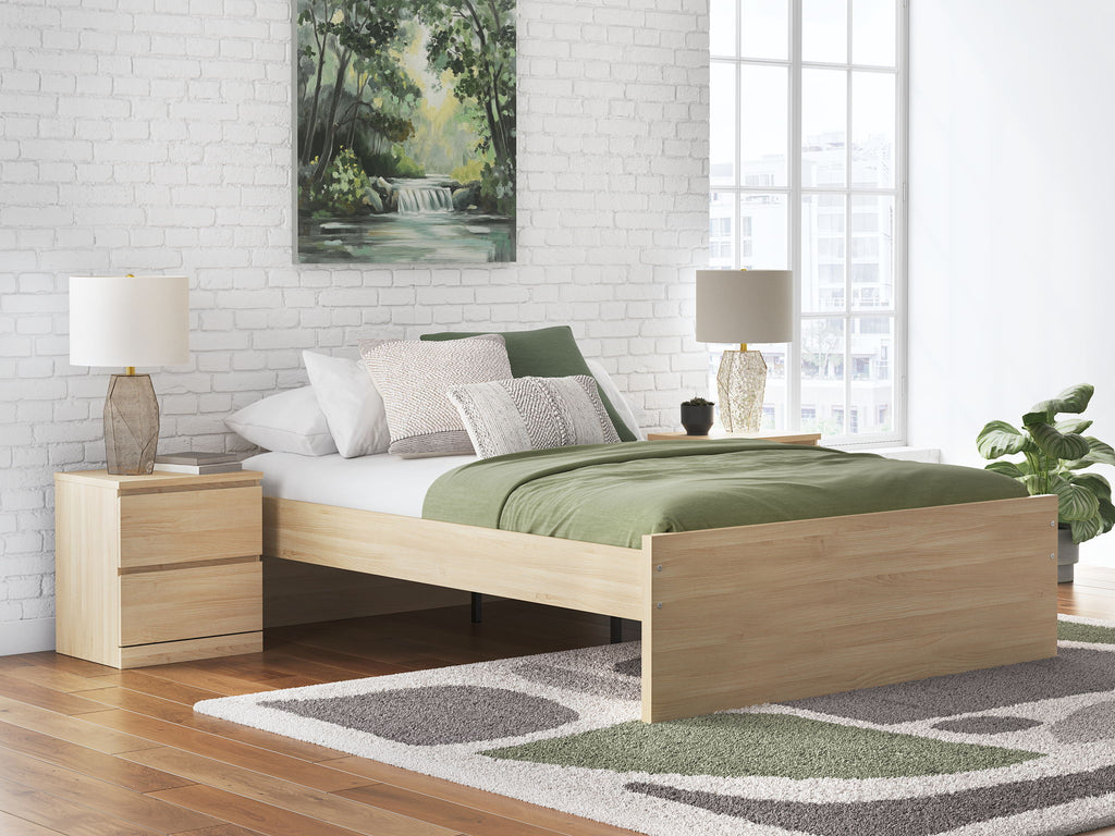 Light brown platform bed with slatted base and low side rails, no front drawer shown