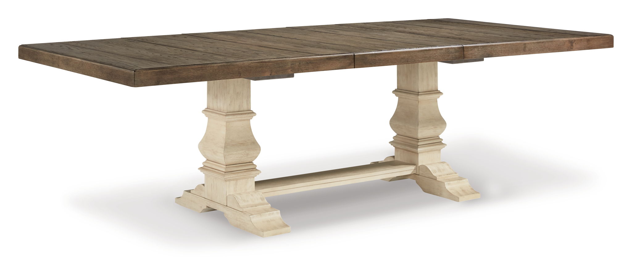 Rectangular dining table with dark wood top and cream pedestal base