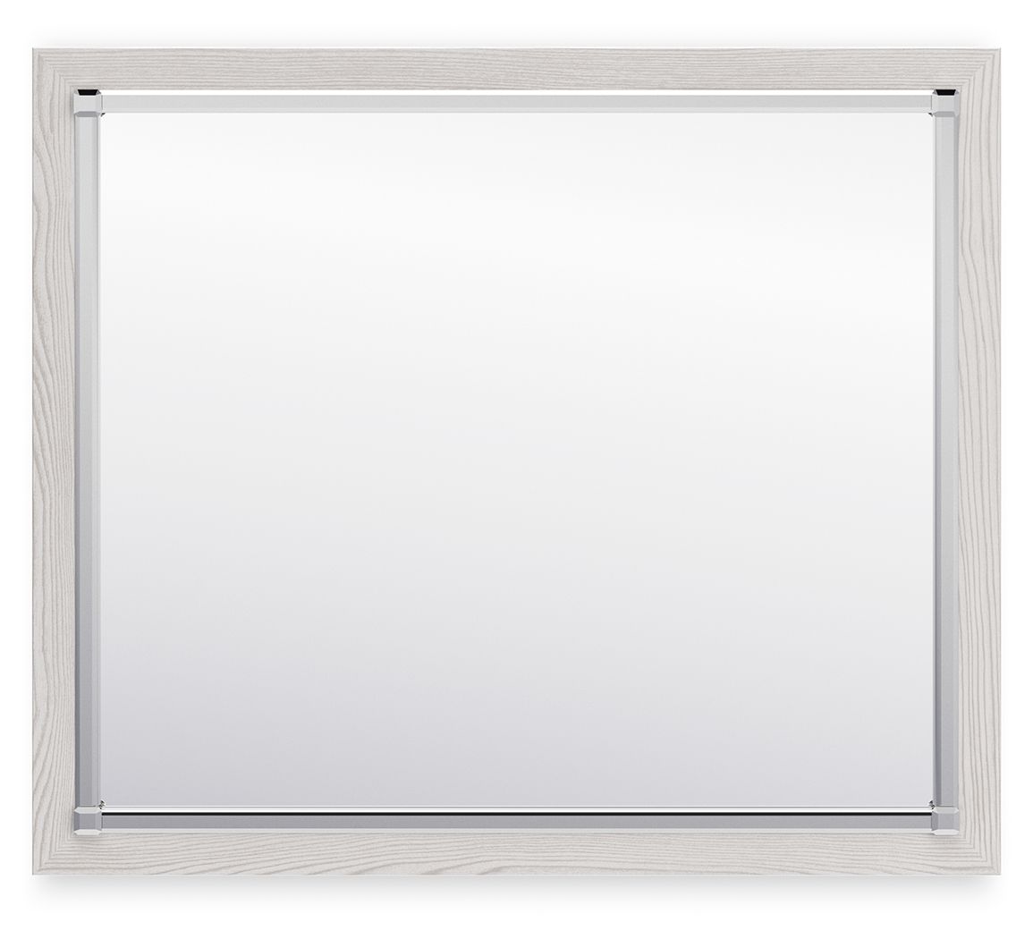 Bedroom mirror with light wood frame, silver corners and smooth glass surface