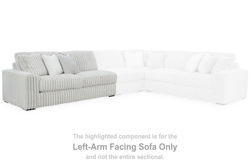 Light gray sectional sofa corner with ribbed fabric and short left arm
