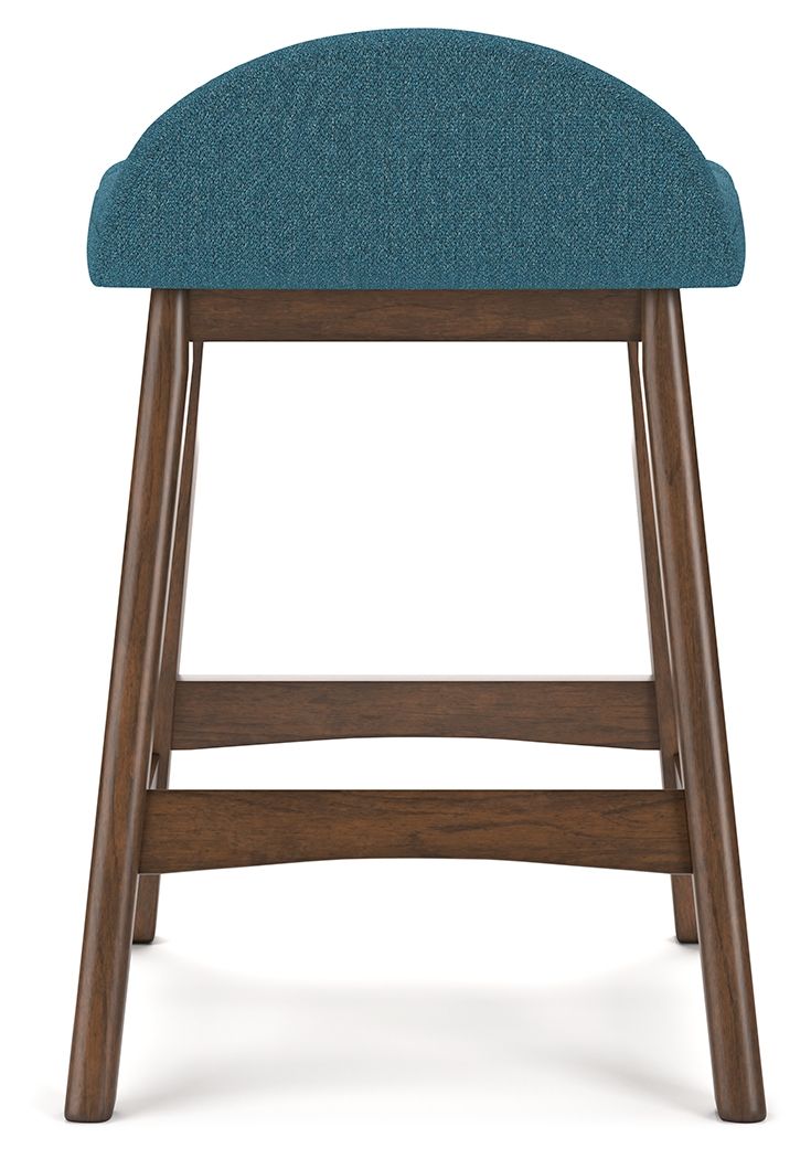 Upholstered barstool with teal blue fabric seat and curved back, visible wood frame.