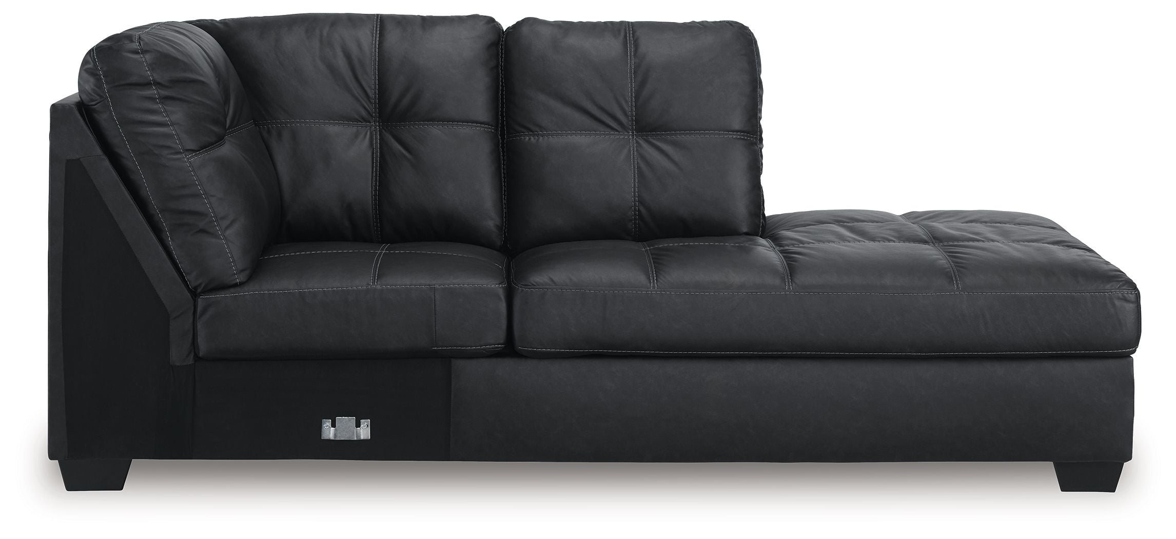 Dark charcoal corner chaise with tufted back, padded arms, and low block legs
