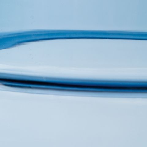 Bealen blue glass vase close-up of smooth rim and banded edge