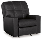Black rocker recliner with tufted back, padded armrests, and cushioned seat