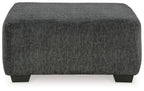 Oversized accent ottoman, dark gray textured fabric, square profile, short block legs