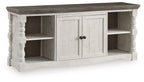 TV stand with two paneled doors, dark brown top, light beige frame and open side cubbies