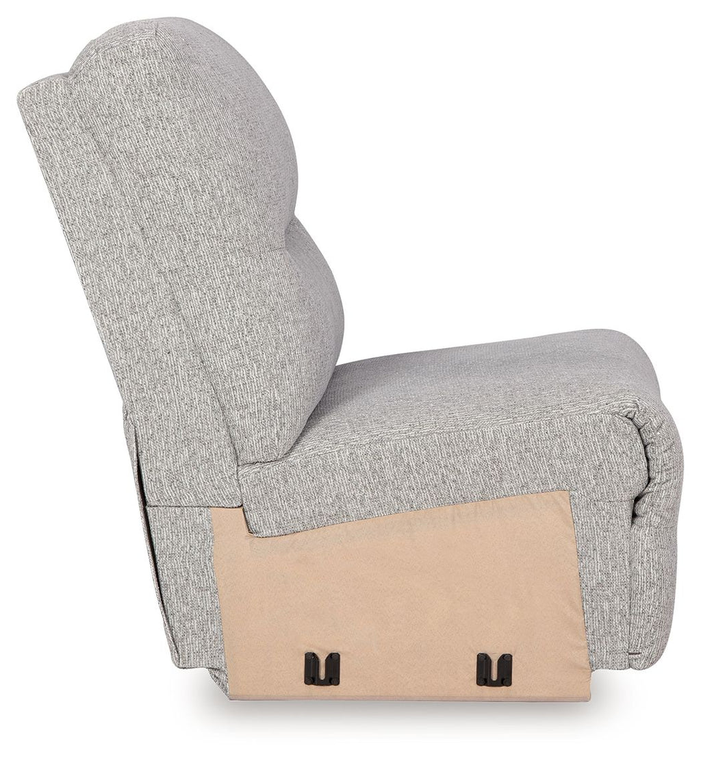 Pewter gray upholstered armless chair, side view, with visible base panel