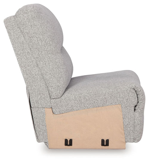 Pewter gray upholstered armless chair, side view, with visible base panel
