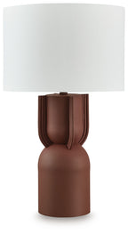Brick-red metal table lamp with white drum shade and fluted base
