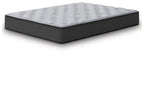 Gray mattress with quilted top and dark base, side angle view