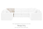 Upholstered wedge sectional module with tufted back and curved armrests, light beige