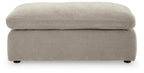 Light gray ottoman with smooth fabric upholstery and short legs